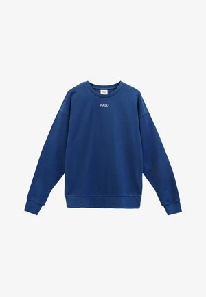 Granatowy polar wykonany z materiału bawełnianego. Posiada okrągły dekolt, ściągacze przy mankietach oraz małe białe logo na klatce piersiowej.