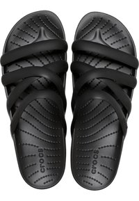 Black Crocs slides with three wide, textured straps and a molded footbed featuring dotted lines for grip. Made of durable synthetic material.