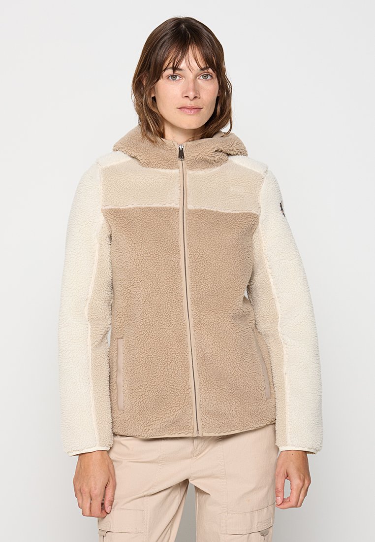 Veste en polaire avec un design bicolore beige et crème, avec une fermeture éclair et une capuche. Texture douce avec des poches latérales.