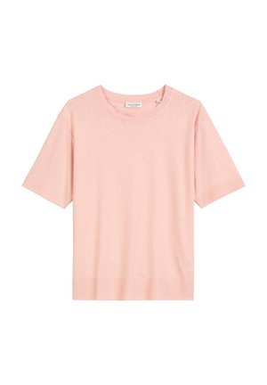T-shirt rose clair à manches courtes avec un col rond, fabriqué en matériau doux, présentant une coupe légèrement ample et une petite étiquette logo sur le côté.