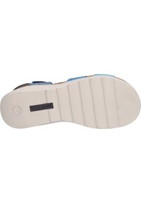 Sandal sole featuring a beige textured surface with horizontal grooves; heel area is slightly elevated, no distinct patterns or accents visible.