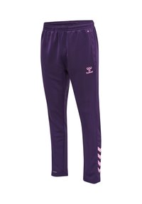 Pantalon de sport violet avec logo hummel rose sur la cuisse et bandes chevron roses sur la partie inférieure de la jambe droite, taille élastique et poches latérales.