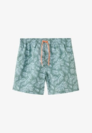Zeleni kopalni šort z svetlim vzorcem palminih listov in oranžnim pasom z vrvico, položen na belem ozadju.
