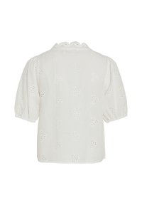 Blouse blanche à manches courtes avec motifs floraux découpés brodés et un col rond festonné, vue de dos.