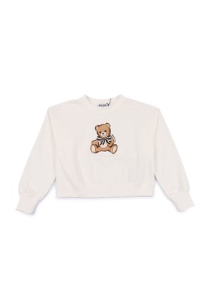 Sweatshirt bianco tagliato, realizzato in cotone, con un ricamo di un orso marrone con un fiocco in bianco e nero. Polsini e scollatura a costine.