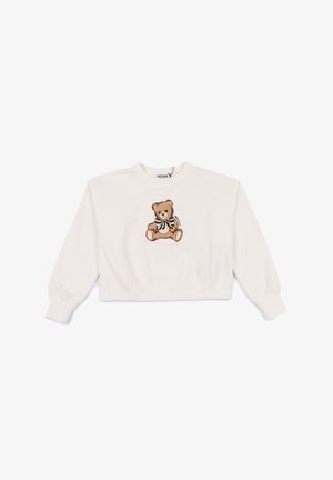 Sweatshirt bianco tagliato, realizzato in cotone, con un ricamo di un orso marrone con un fiocco in bianco e nero. Polsini e scollatura a costine.