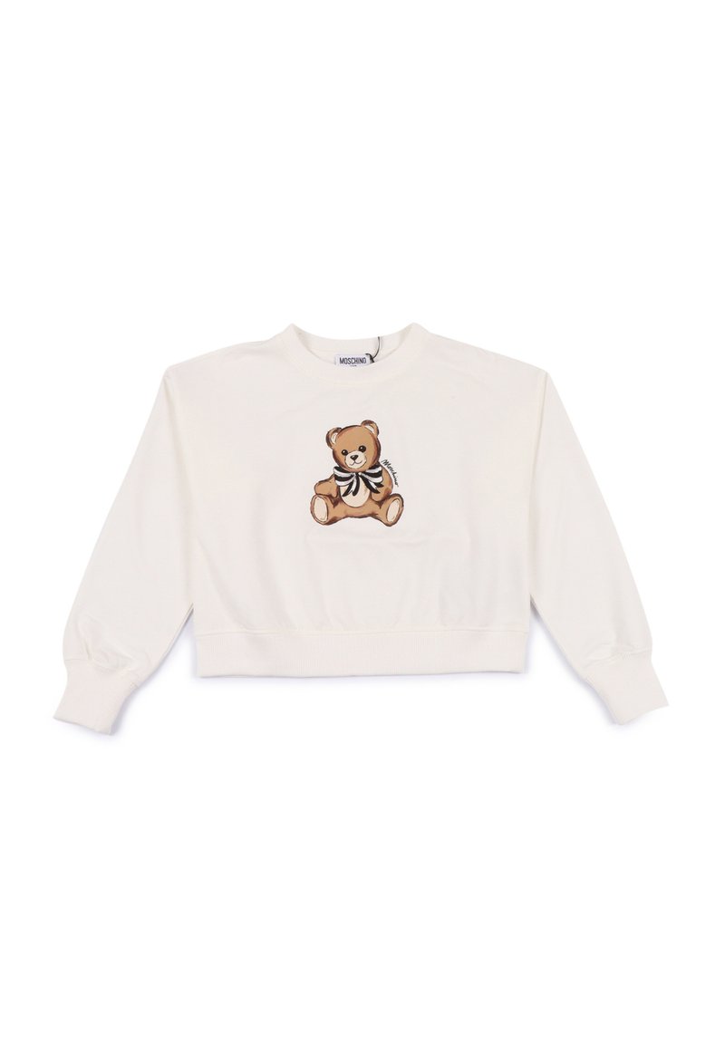 Sweatshirt bianco tagliato, realizzato in cotone, con un ricamo di un orso marrone con un fiocco in bianco e nero. Polsini e scollatura a costine.