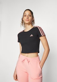 adidas Sportswear ESSENTIALS 3 STRIPES BABY - Potiskana majica - black/semi pink spark