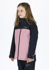 Waterproof jacket featuring a navy upper section and a light pink lower section. Smooth fabric, full zip, hood, and logo accents.