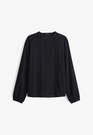 Schwarzes Langarmshirt mit vertikalem Rippstruktur, runder Halslinie und Knopfverschluss. Weicher Stoff mit leicht lockerer Passform.