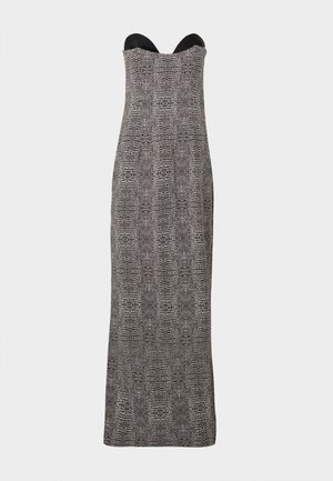 Strapless long dress with a fitted bodice, featuring a black and white abstract reptile pattern and a sweetheart neckline.