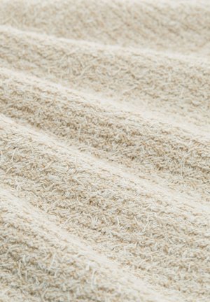 Cremfarbenes, strukturiertes Gewebe mit kleinen Schlaufen und Rillen, die ein weiches, ungleichmäßiges Oberflächenmuster erzeugen.