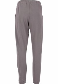 Grå, lätta joggers med elastisk midja, snäva ben och sidofickor. Slät textur med minimala sömnadsdetaljer.