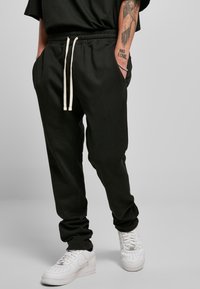 Urban Classics - SIDE ZIP  - Jogginghose - black Thumbnail-Bild 1