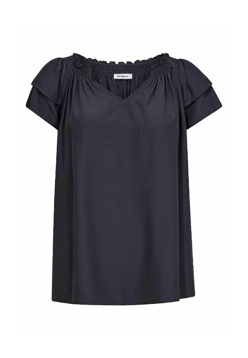 Blusa blu navy con scollatura a V, maniche corte a sbuffo e dettagli arricciati alla scollatura. Realizzata in un tessuto leggero.