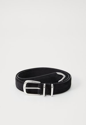 Black suede belt with a smooth texture, featuring a shiny silver buckle and metal prongs. The belt is flat and has multiple sized holes for adjustment.