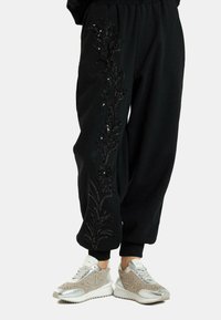 Alma en Pena Pantalones deportivos - nero