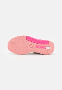 Shoe outsole with pink and white color scheme. Textured rubber surface featuring a herringbone pattern and an engraved "DUAL DENSITY" label.