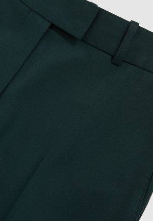 Dark green tailored trousers with a belt loop and visible front crease on smooth fabric.