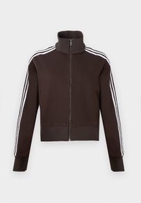 Καφέ ζακέτα με φερμουάρ και ψηλό γιακά, με λευκές λωρίδες στα πλάγια και ριμπ μανσέτες και τελείωμα. Μαλακό ύφασμα με εφαρμοστή γραμμή.