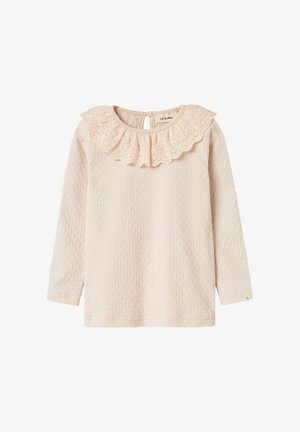 Langarmshirt in hellrosa, aus strukturiertem Stoff mit einem gewellten, spitzen Rüschensaum und Knopfverschluss hinten.