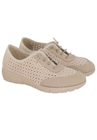 Zapatos casuales beige con cordones, laterales perforados y punteras sólidas, con suelas gruesas de goma texturizada para mayor comodidad y agarre.