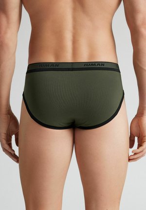 Olive green men's briefs with a black elastic waistband. The fabric appears smooth with a fitted design and minimalistic stitching details.