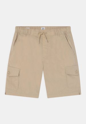 Beige knælange cargoshorts med elastisk taljebånd, snørelukning, sidelommer og knaplukning på lommerne på hvert ben.