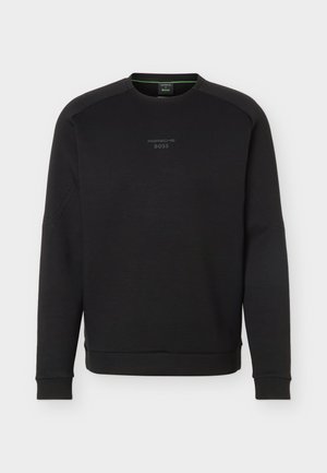 Black crewneck sweatshirt with long sleeves, subtle "Porsche BOSS" logo on chest, ribbed cuffs and hem, displayed on light gray background.