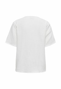 Vit kortärmad topp med ett texturerat, rynkat tyg. Har en avslappnad passform och rund halsringning. Enkelt, utan utsmyckningar.