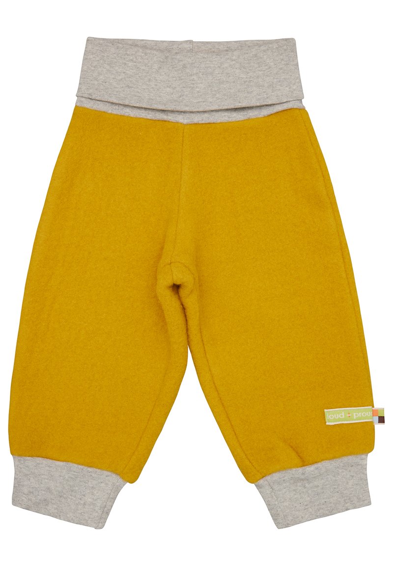 Gelbe Fleece-Hosen mit einem grauen Bund und Bündchen. Weicher Stoff, lockere Passform, mit einem seitlichen Etikett mit Markennamen.