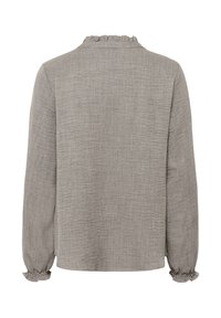 Haut à manches longues de couleur gris clair en tissu texturé. Col à volants et poignets élastiqués. Design simple et décontracté avec une fermeture au dos.