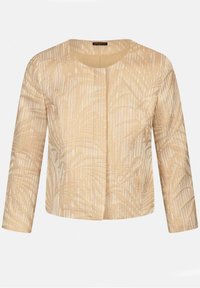 Beige kavaj med ett texturerat mönster av palmblad, rund halsringning, trekvartslånga ärmar och rak passform. Tydligt strukturerad tyg.