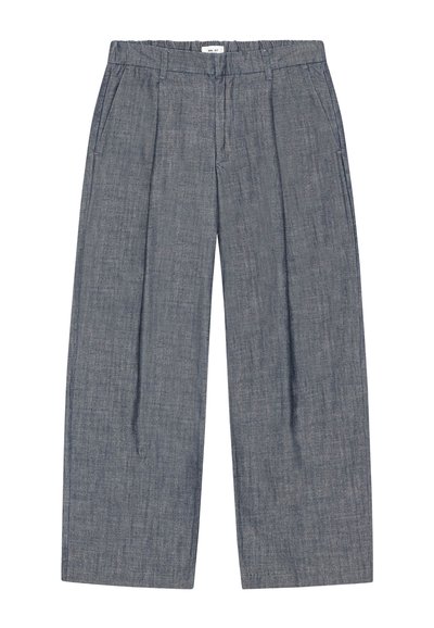 Gray wide-leg trousers with stitched pleats, side pockets, belt loops, and a white label at the elastic waistband.