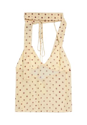 Bézs színű, barna pöttyös, nyakba akasztható felső, mély V-nyakkivágással és hosszú pántokkal a nyak körüli megkötéshez.