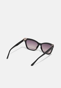 Guess Aurinkolasit - shiny black