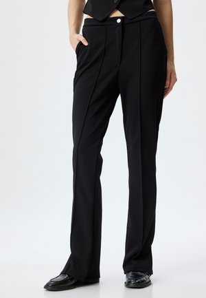 SLIT DETAIL - Pantalones - black