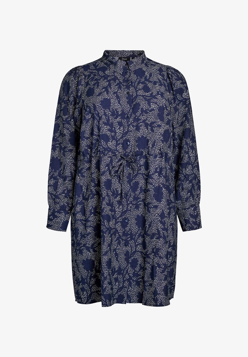 Abito blu navy con un motivo floreale bianco. Presenta una chiusura con bottoni sul davanti, maniche lunghe, un colletto e una vita con cintura. Realizzato in un tessuto morbido.