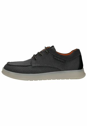 Grå mesh sneakers med mørke accenter, kontrasterende orange inderside, runde snørebånd og en hvid gummisål. Brandmærket er synligt på ydersiden.