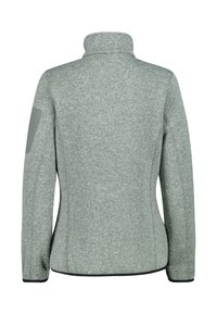 Harmaa fleece-takki, jossa on korkea kaulus, sivupaneelit ja kyynärpääpaikat. Takissa on teksturoitu kuviointi ja musta reuna helmassa ja hihoissa.