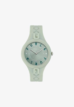 Orologio rotondo con un cinturino in silicone verde chiaro. Il quadrante verde chiaro presenta lettere in rilievo "FURLA" e lancette argentate con una cassa bianca texture.