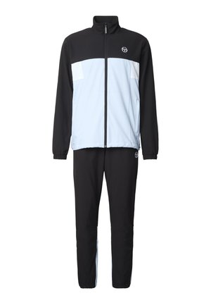 Chándal bicolor en negro y azul claro con chaqueta de cremallera completa y puños elásticos, con un pequeño logo blanco en el pecho y el muslo.