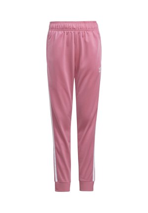 Pantalon de survêtement rose Adidas avec taille élastique, bandes blanches sur les côtés, poignets côtelés aux chevilles et petit logo Adidas sur la cuisse supérieure.