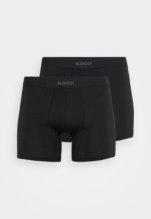 Černé bavlněné boxerky s těsným střihem, s logem na pase a funkčním rozparkem. Měkká textura a jednoduchý design. Balení obsahuje dvě kusy.