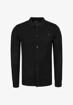 Czarny kardigan na guziki z długim rękawem i kołnierzykiem, z subtelnym wytłoczonym logo na lewej piersi oraz ściągaczami na mankietach i u dołu.