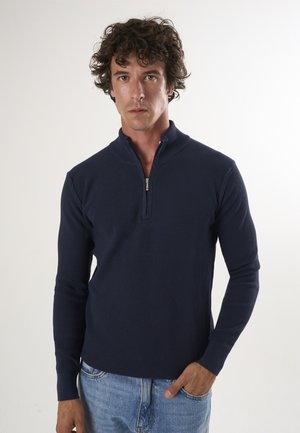 - Sweter