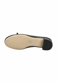 Suola di scarpa nera con una forma liscia e arrotondata; presenta una soletta beige chiaro e un tacco nero testurizzato per aderenza e stabilità.