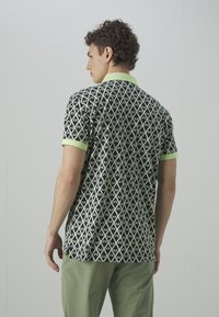 J.LINDEBERG Sports TOUR TECH REG FIT - Polo shirt - geo jl navy