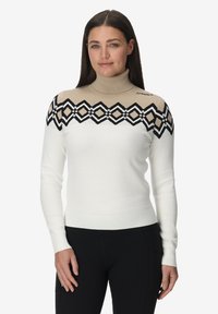Gebreide coltrui in het wit met een beige en zwart geometrisch patroon op de borst. Voorzien van geribbelde manchetten en zoom.