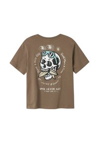 Brown cotton T-shirt featuring a graphic of a skull with sunglasses, palm trees, and text. Short sleeves and crew neck design.